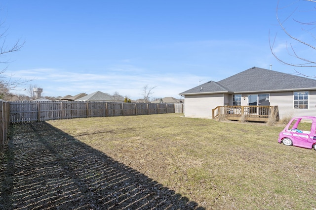 view of yard with a deck