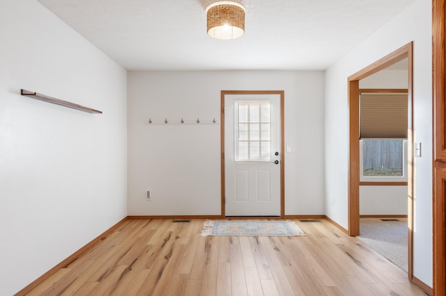 doorway featuring light wood-type flooring