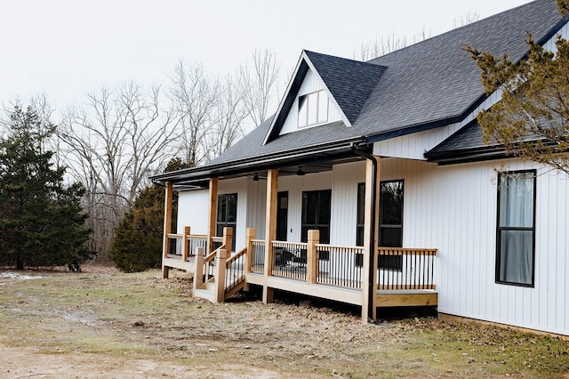 rear view of property featuring ceiling fan