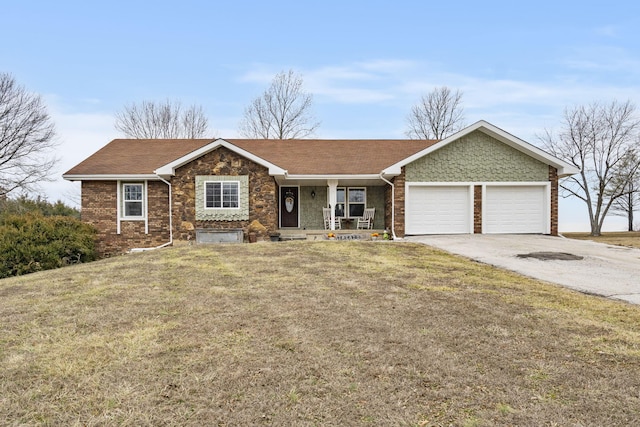 ranch-style home with a garage, a porch, and a front lawn