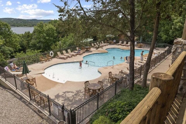 view of swimming pool featuring a patio area