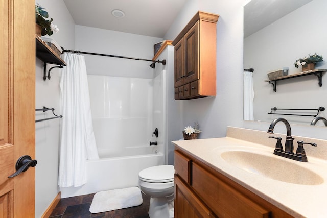 full bathroom featuring shower / bath combo, vanity, and toilet