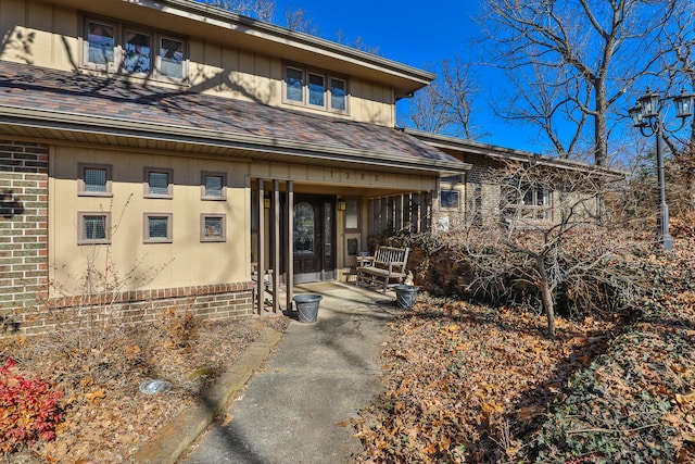 entrance to property with a patio