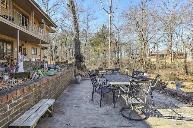 view of patio with a balcony