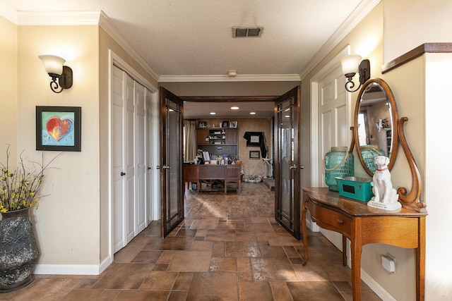 hall featuring ornamental molding