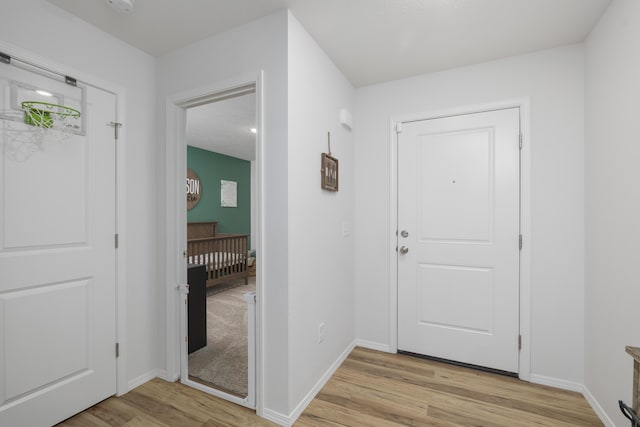 foyer featuring light wood-type flooring