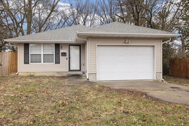 single story home featuring a garage