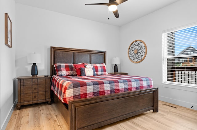 bedroom featuring ceiling fan and light wood-type flooring