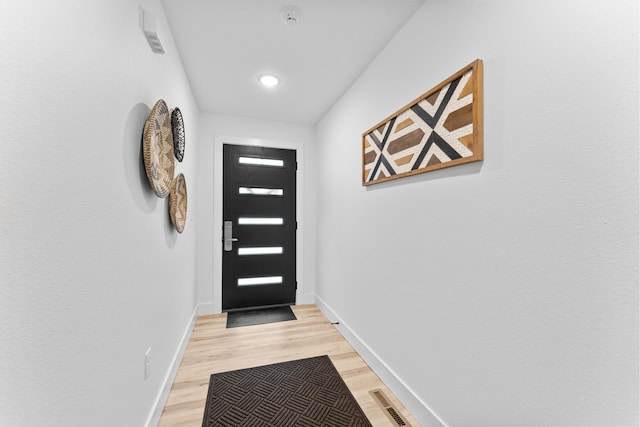 doorway featuring light hardwood / wood-style floors