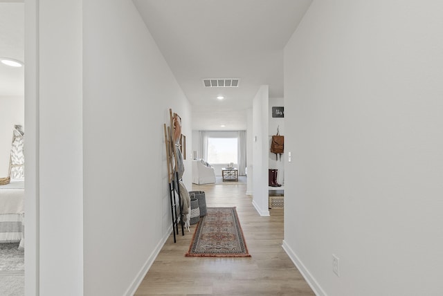 hall featuring light hardwood / wood-style flooring