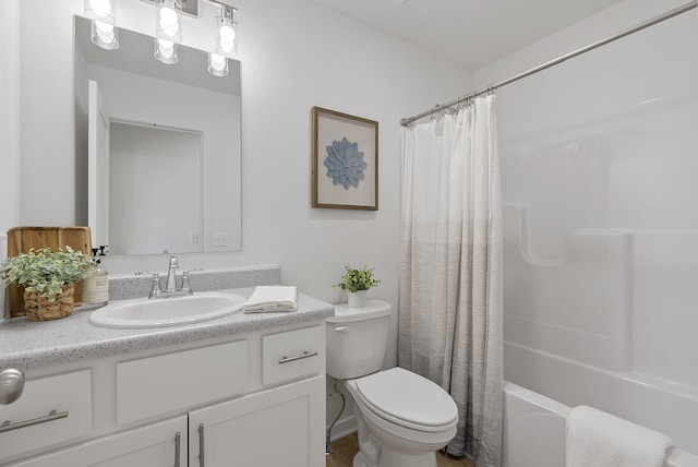 full bathroom featuring vanity, toilet, and shower / bath combo