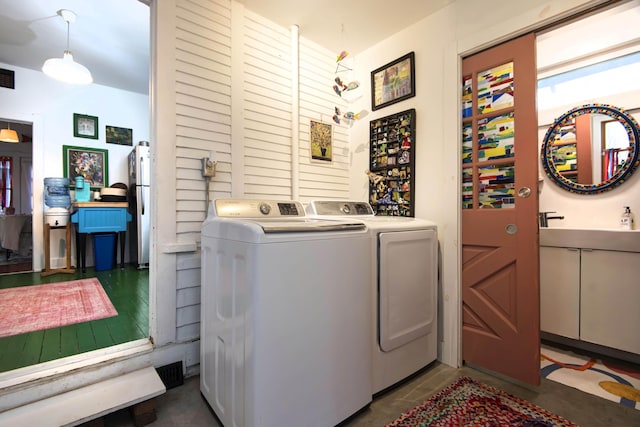 laundry room featuring independent washer and dryer