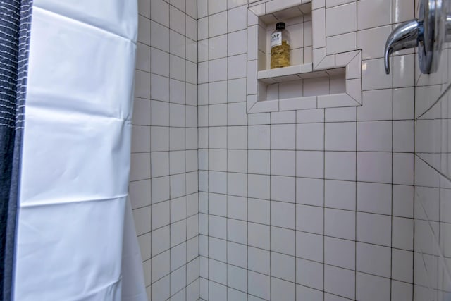 bathroom featuring a shower