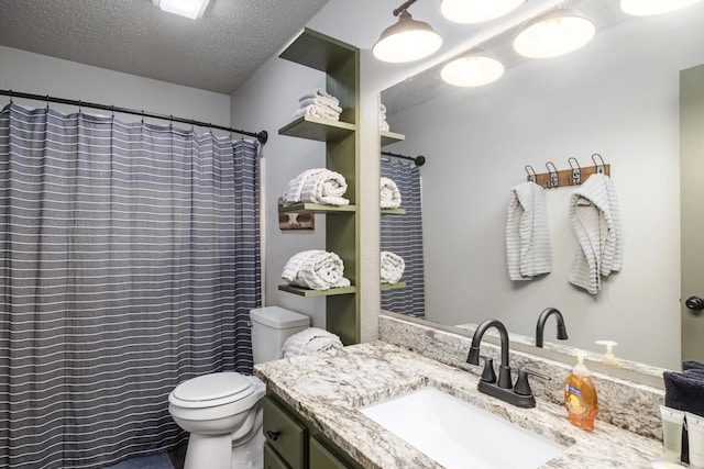 bathroom with vanity, toilet, a textured ceiling, and a shower with shower curtain