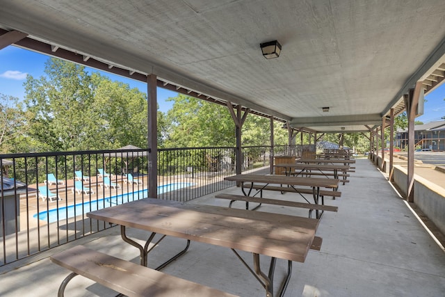 view of patio with a community pool