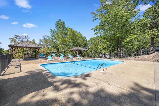 view of pool with a gazebo and a patio