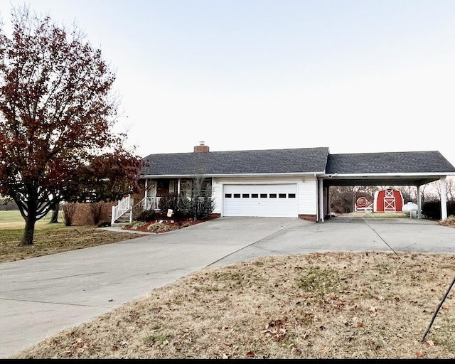 single story home featuring a garage and covered porch