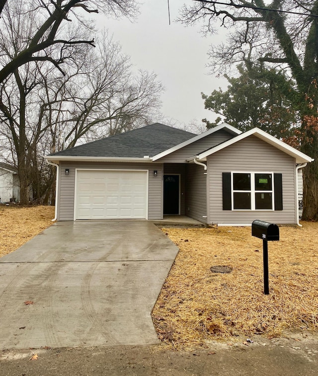 ranch-style house with a garage