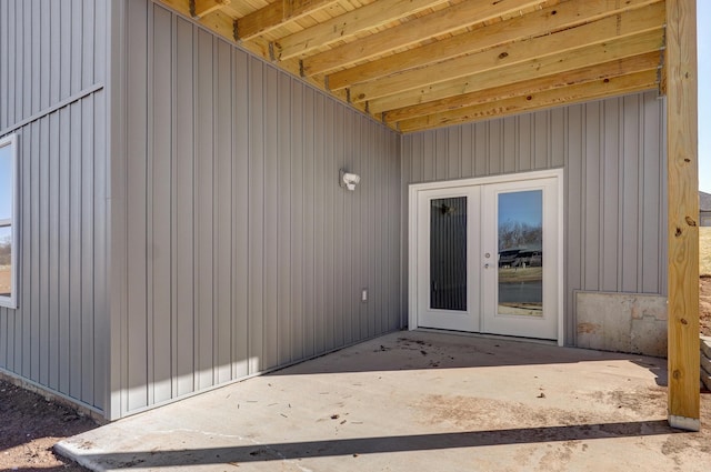 doorway to property with a patio area and french doors