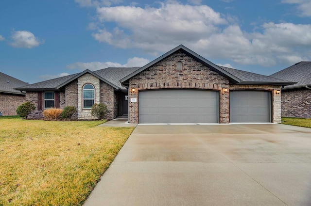 view of front facade featuring a garage and a front yard