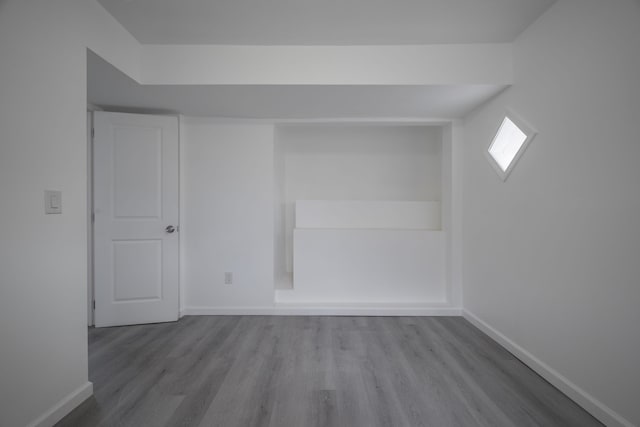 spare room featuring light hardwood / wood-style floors