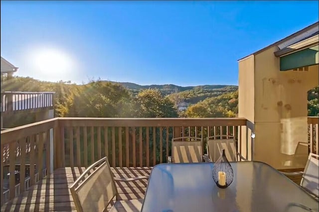 balcony featuring a mountain view