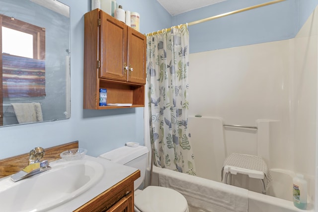 full bathroom featuring vanity, shower / tub combo with curtain, and toilet