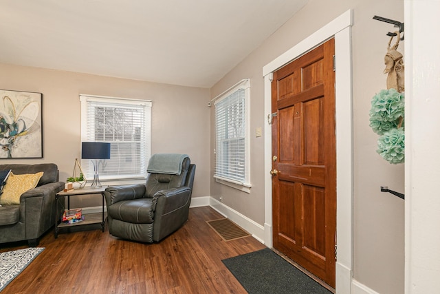 entrance foyer with dark hardwood / wood-style flooring