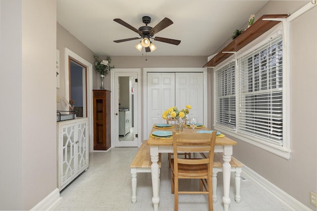 dining space with ceiling fan