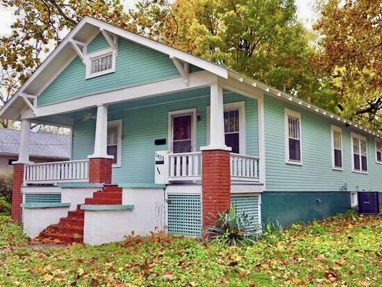 view of front facade with central AC unit and covered porch