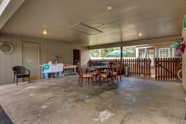 dining space with concrete flooring