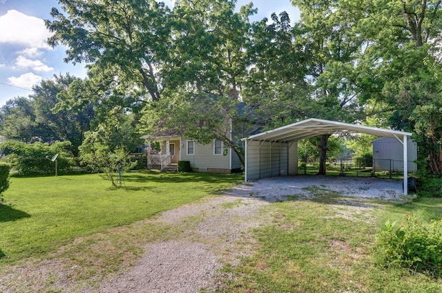 view of yard with a carport