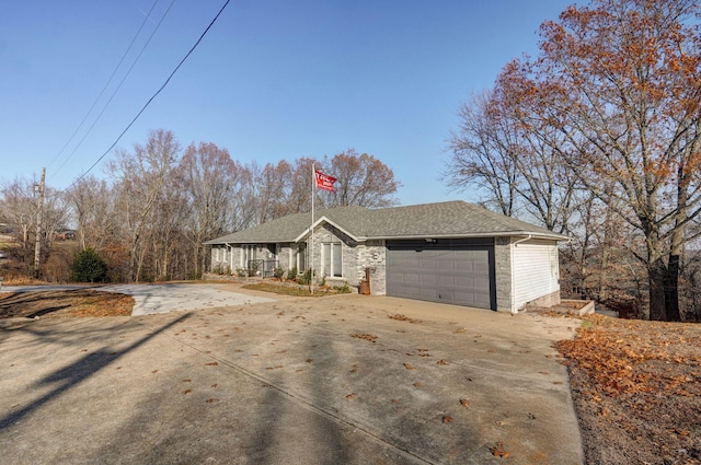 single story home with a garage