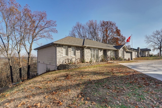 ranch-style home with a garage