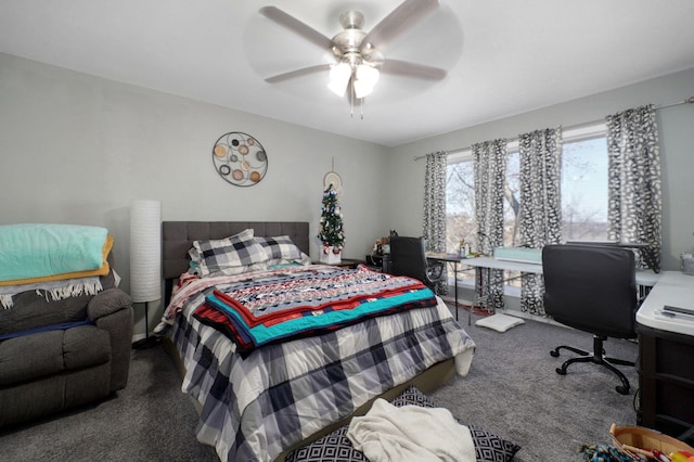 bedroom featuring dark colored carpet and ceiling fan