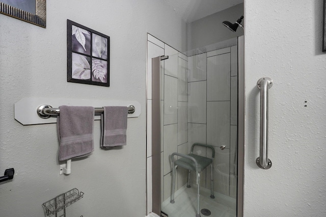 bathroom featuring an enclosed shower