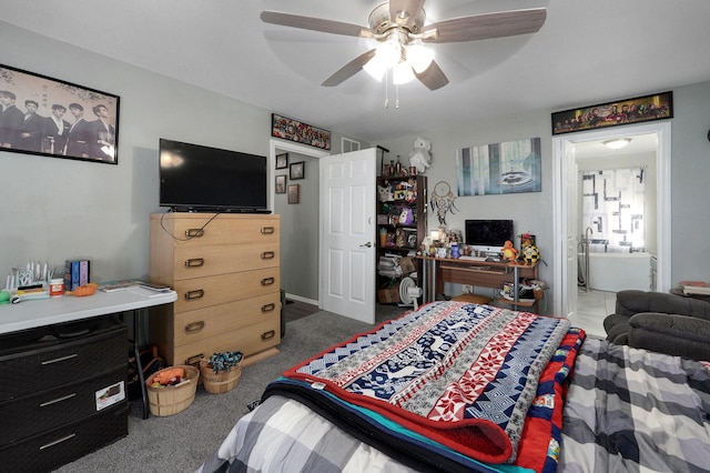 bedroom featuring connected bathroom, carpet floors, and ceiling fan