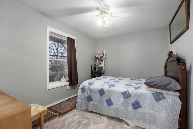 bedroom featuring ceiling fan