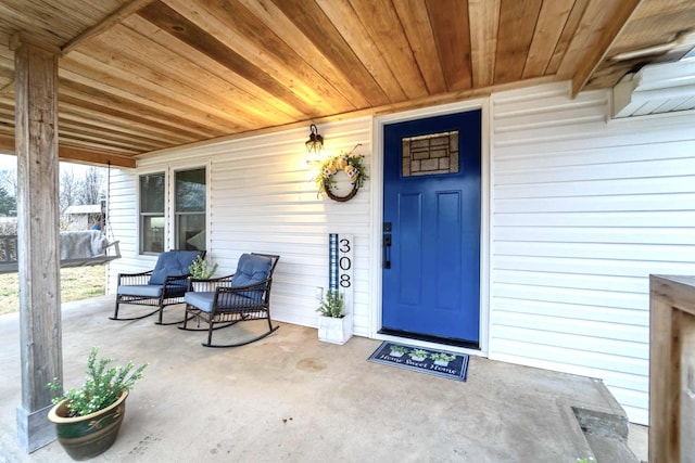 doorway to property with covered porch