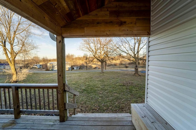 deck featuring a yard