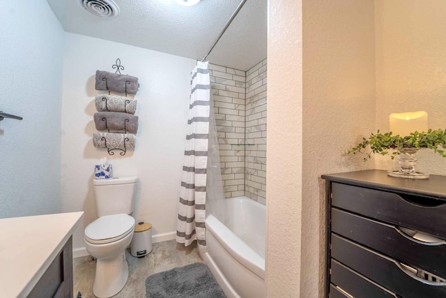 full bathroom featuring shower / bath combo, vanity, a textured ceiling, and toilet