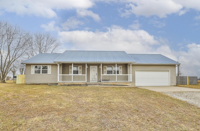 ranch-style home featuring a porch, a garage, and a front lawn