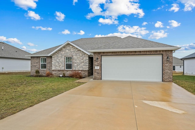 ranch-style house featuring a garage and a front lawn