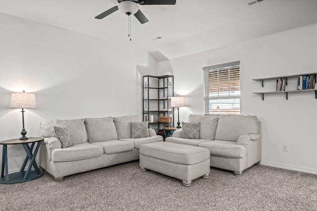 living room with carpet floors and ceiling fan