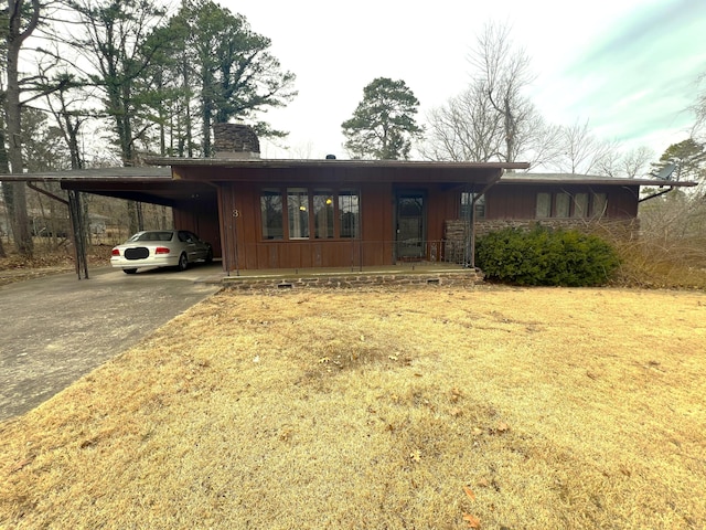 view of front of house with a carport