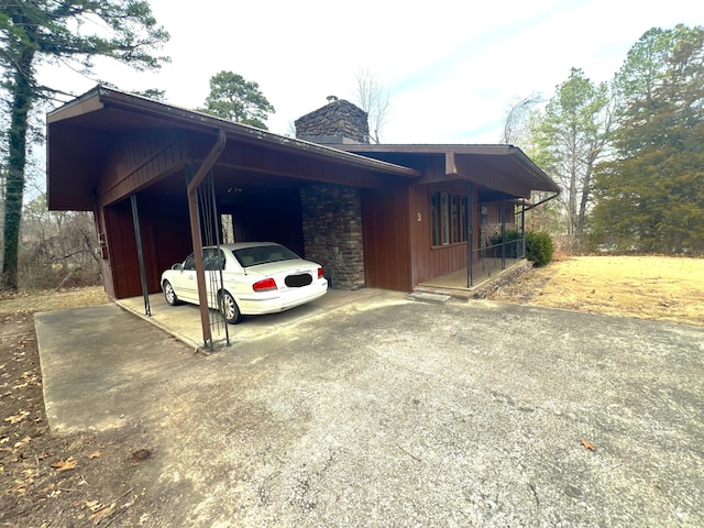 view of property exterior featuring a carport