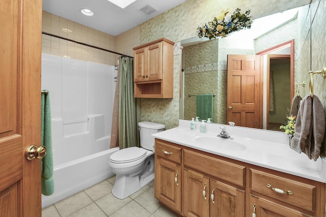 full bathroom with vanity, shower / bath combo, tile patterned floors, and toilet