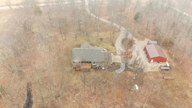 birds eye view of property with a rural view