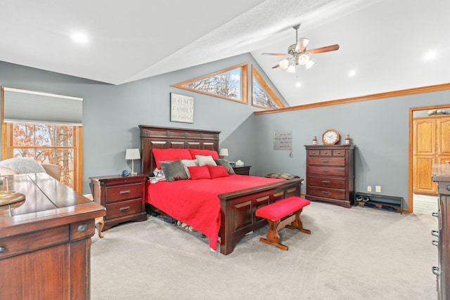 carpeted bedroom with lofted ceiling and ceiling fan