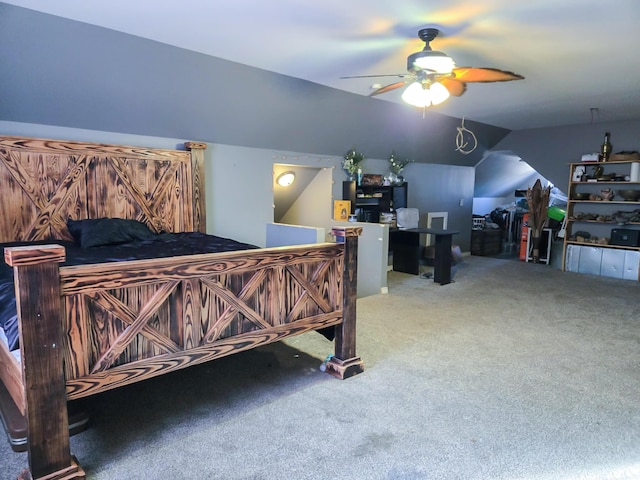 bedroom featuring lofted ceiling, ceiling fan, and carpet flooring